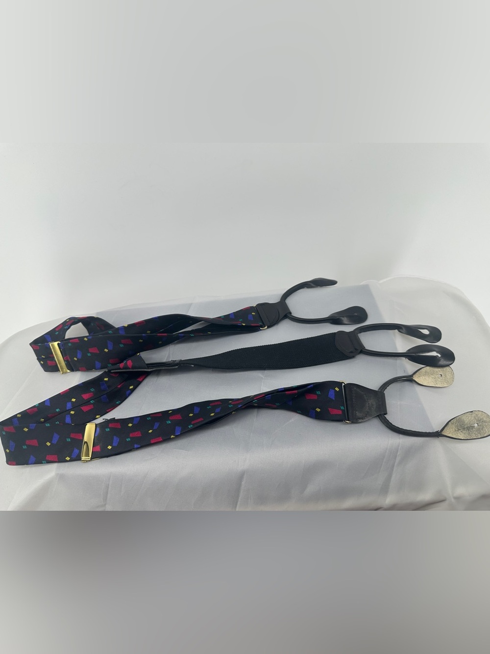 Vintage silk colorful design with black background suspenders